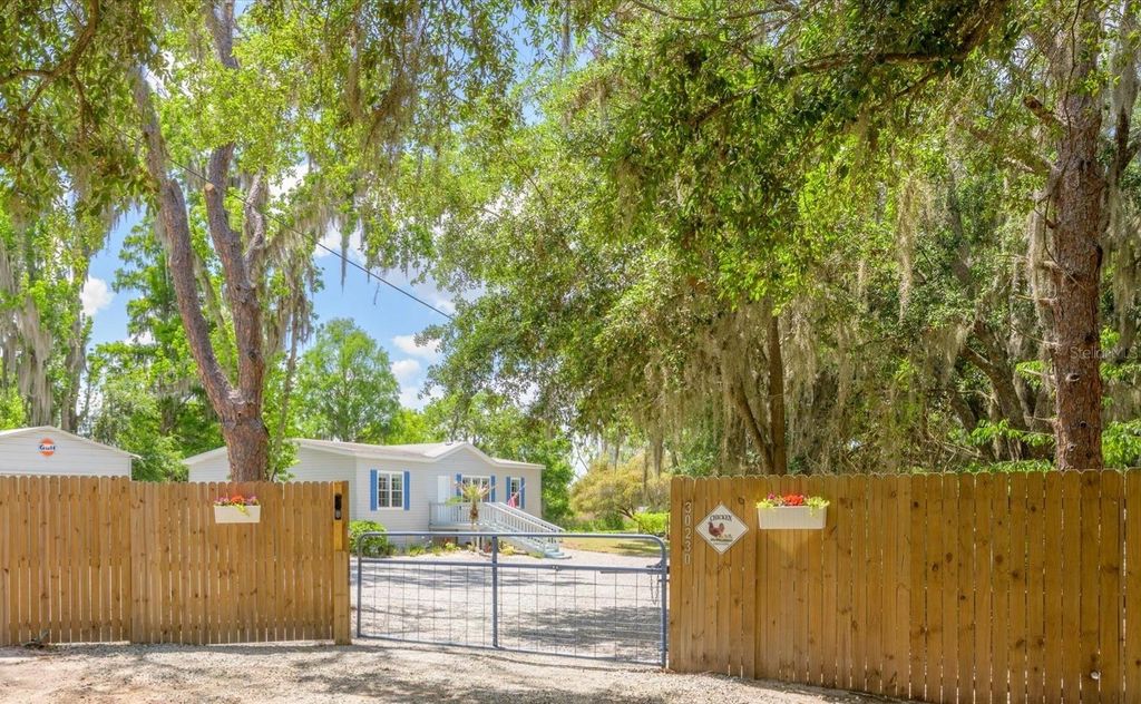 Photo of 30230 Palm Lane, Wesley Chapel, FL 33545 (MLS # TB8497266)