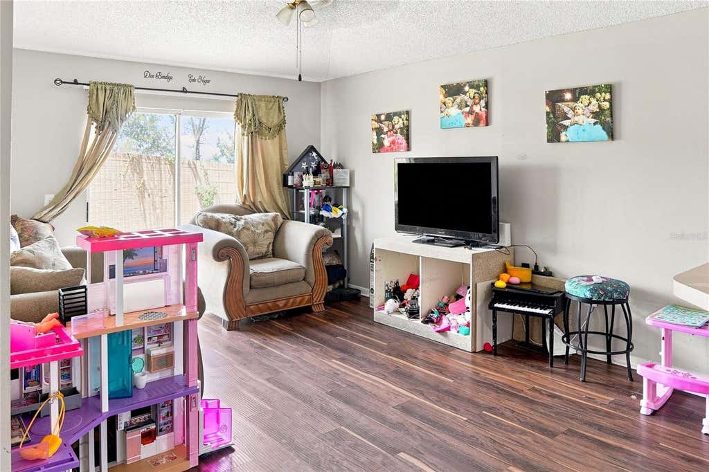 Photo of 4243 Mendenwood Lane, Orlando, FL 32826 (MLS # O6432931)