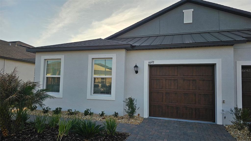 Photo of 6693 Homebound Way, New Port Richey, FL 34655 (MLS # J998407)