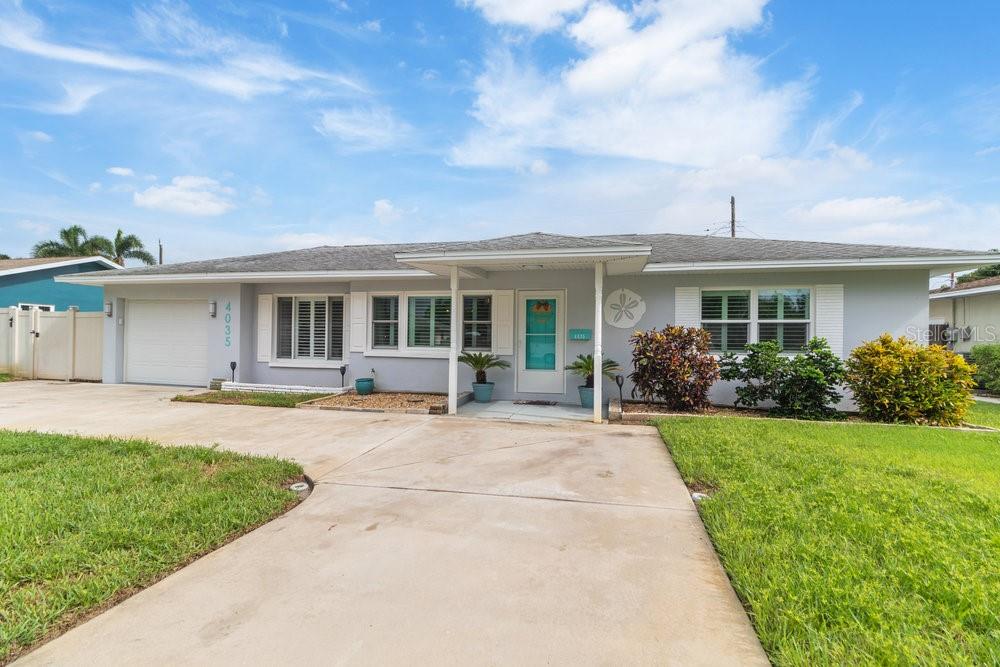 Welcome to 4035 26th Avenue N in St. Petersburg—a beautifully updated 3-bedroom, 2-bath residence offering 1,697 square feet of comfortable living space. Nestled on one of the highest points in Pinellas County and located in a desirable X flood zone, this home has been thoughtfully enhanced with hurricane-rated windows for added security and peace of mind. From the moment you arrive, you’ll notice the pride of ownership with fresh interior and exterior paint, an upgraded two-way driveway, and a well-maintained yard that sets the tone for what awaits inside.
Step through the front door to find original terrazzo flooring throughout all common areas, including the kitchen, creating a timeless and durable finish. The kitchen underwent a full renovation in 2019 and showcases granite countertops, solid wood cabinetry, and stainless steel appliances—including refrigerator, microwave, dishwasher, and double oven range—all updated in 2023. Both the kitchen and guest bathroom were remodeled down to the studs, with the guest bathroom completed in 2018, ensuring a modern and move-in-ready experience. Custom plantation shutters add a refined touch throughout the home.
In 2021, a 650-square-foot addition was completed, expanding the home to nearly 1,700 square feet. This thoughtfully designed space features a spacious living room and a private primary suite with dual walk-in closets and a spa-inspired bathroom with dual sinks and a walk-in shower. Finished with ceramic tile flooring, the addition offers versatile use—ideal as a luxurious retreat or as an in-law suite for multigenerational living.
Outdoor living is just as inviting with a 20' x 30' extended patio and a gazebo overlooking the lush backyard, perfect for entertaining, barbecues, or enjoying Florida sunshine. Most furnishings are negotiable, allowing for an easy transition.
Ideally located close to vibrant downtown St. Petersburg, award-winning Gulf beaches, shopping, and dining, this home is also just a short walk to Gladden Park, less than two miles from JW Cate Park, and a quick drive to Tampa International Airport—offering the very best of Florida living in one of the area’s most desirable locations. Its prime location and modern updates also make this home an excellent opportunity for use as a short-term rental property.
