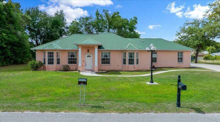 This 3 bedroom, 2 bathroom house located in Orange Blossom Hills offers both privacy and convenience. The location of this home is ideal, just 1 mile from Publix, shopping and several restaurants all while being tucked away in a quiet, peaceful neighborhood. As you drive up, the first thing you will notice is the oversized driveway and parking area, allowing plenty of room for family and friends. The high ceilings and a grand cathedral greet you as you enter this wonderfully maintained home. The floor plan flows seamlessly from room to room offering a natural flow that is not only inviting but functional. The primary bedroom is spacious and offers a walk in closet as well as a large primary bathroom with double vanities, soaking tub and a generous walk in shower. Don't miss the opportunity to make this beautiful house your home!