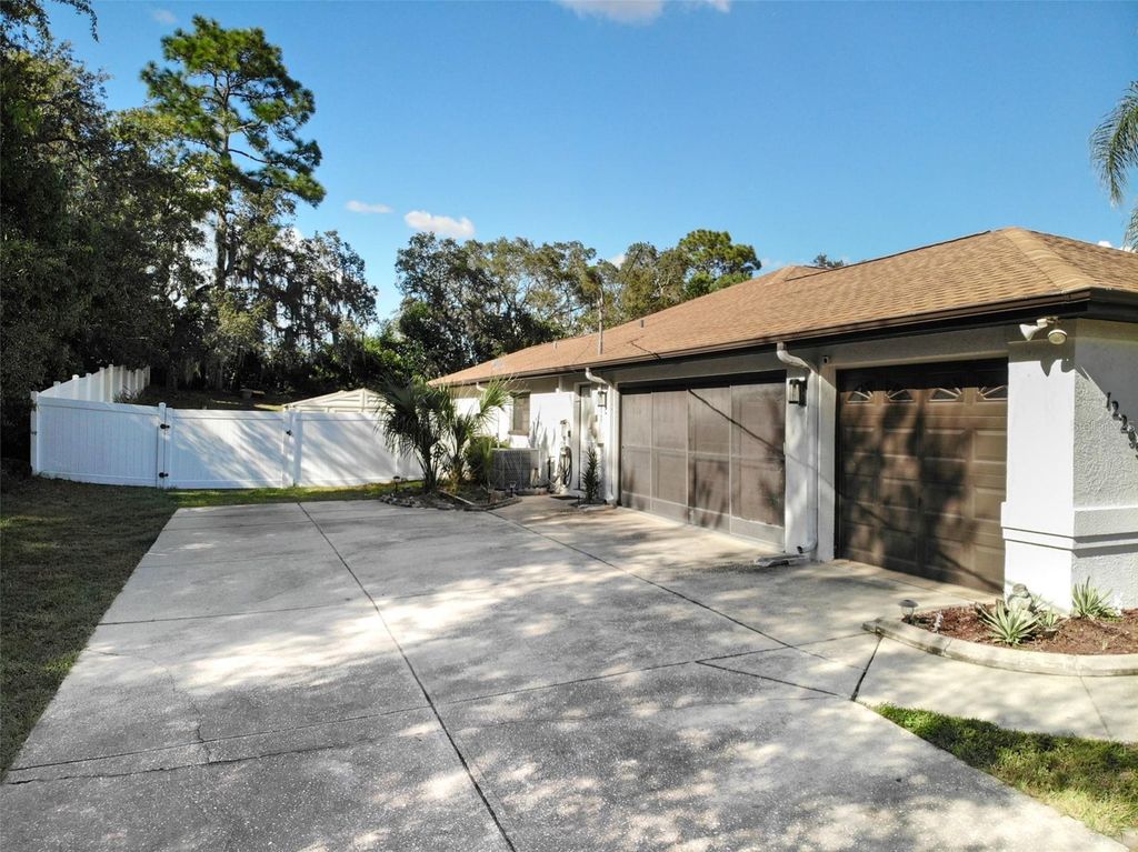Photo of 12295 Comstock Street, Spring Hill, FL 34609 (MLS # W7879399)