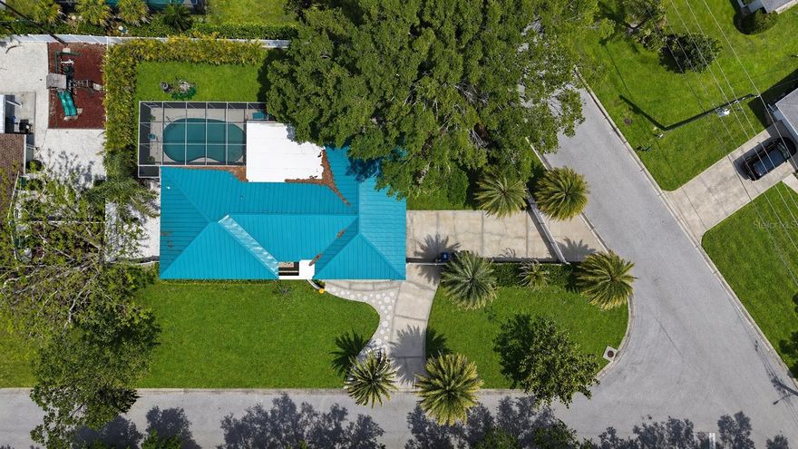 A rare offering within Sarasota’s desirable South Gate community, this meticulously restored Atomic Ranch embodies the essence of authentic Mid-Century Modern design. Revered as one of the foundational architectural styles of the 20th century, this residence has been thoughtfully preserved and elevated by discerning owners who understood the importance of honoring its original integrity.

Ideally positioned in the heart of Sarasota, the home offers effortless access to world-class beaches, premier shopping and dining, top-rated schools, Sarasota Memorial Hospital, and the vibrant downtown district.

The residence unfolds with a seamless, open-concept design, featuring three spacious bedrooms and two bathrooms, an inviting eat-in kitchen area, and expansive living areas designed for both comfort and entertaining. Walls of vintage sliding glass doors dissolve the boundary between indoors and out, opening to a generous pool terrace. Both covered and open-air, this creates a true indoor-outdoor lifestyle synonymous with classic Florida modernism.

Authentic details remain beautifully intact, including original terrazzo flooring throughout, vintage architectural elements, and curated mid-century finishes that speak to the home’s heritage. An oversized garage, along with substantial fenced exterior space, provides flexibility for additional parking, including room for a boat or recreational vehicles.

The home has been featured on Sarasota’s renowned “MOD Tour,” celebrated for its originality and preservation. As noted during the tour, the residence showcases vintage sliding glass walls, vibrant period kitchens and baths, and a fluid connection to the pool area. Carefully selected furnishings that reflect the era enhance the spirit of 1960s design.

This is a truly special opportunity to own a piece of architectural history. Thoughtfully restored, exceptionally located, and ready to be experienced.