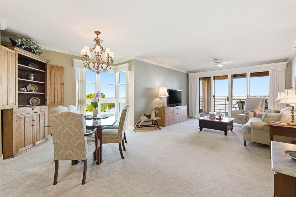 Photo of 4991 Bacopa Lane S #201, St Petersburg, FL 33715 (MLS # TB8463325)