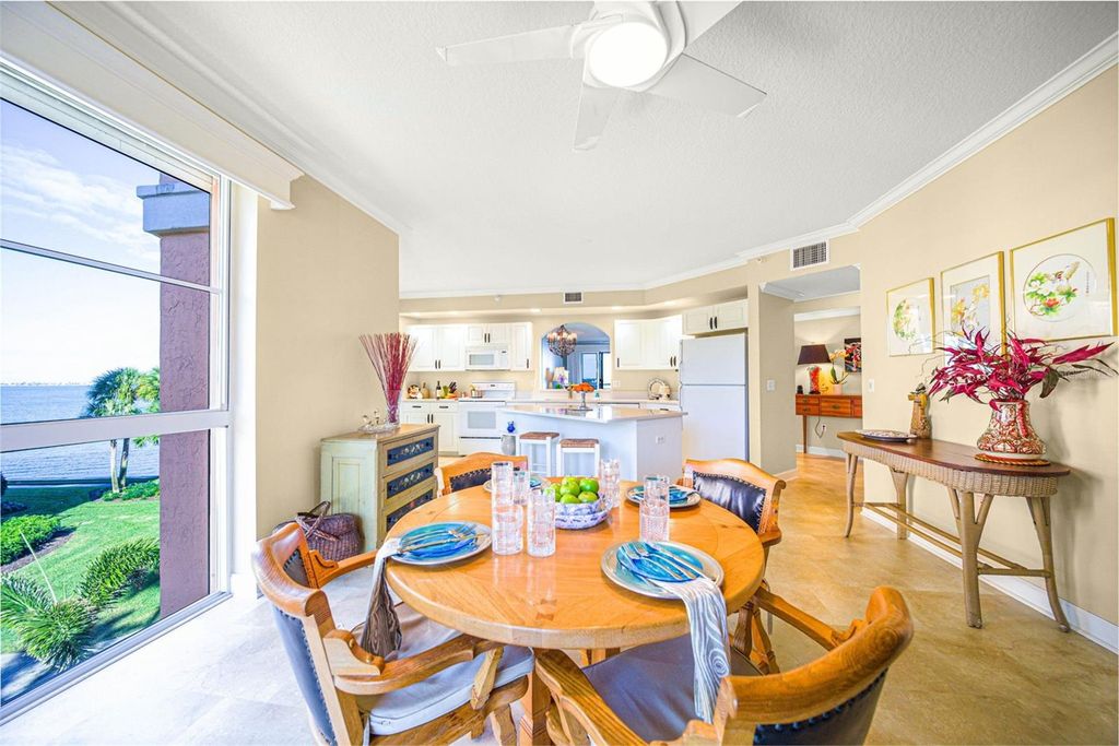 Photo of 4991 Bacopa Lane S #201, St Petersburg, FL 33715 (MLS # TB8463325)