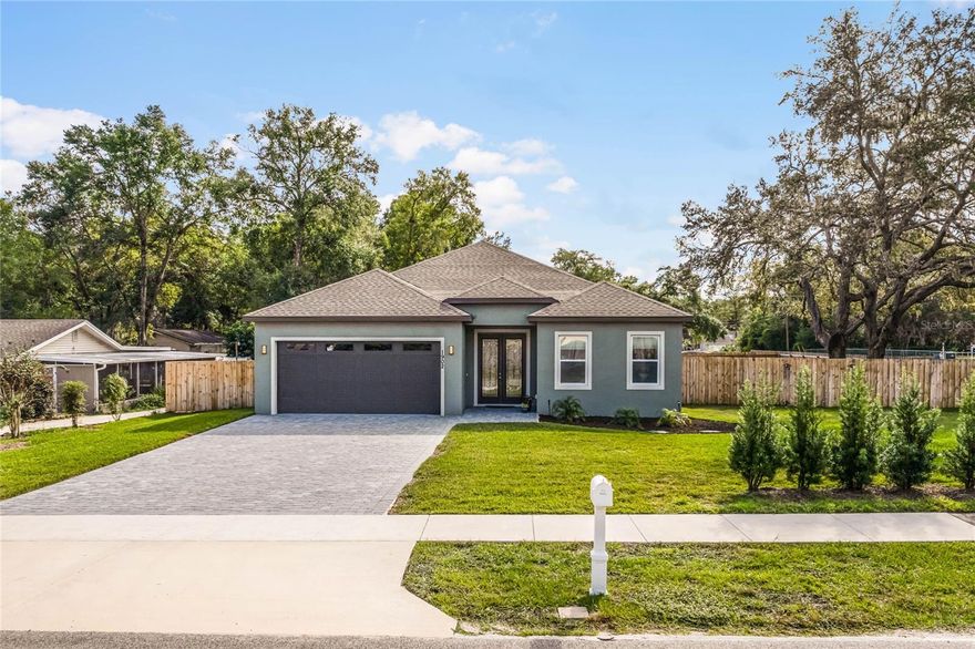 Indulge in the splendor of living just moments away from the pristine beauty of Wekiva State Park while reveling in the convenience of urban amenities. Nestled in one of Apopka's most coveted neighborhoods with NO HOA.  This brand new custom-built, one story home offers a unique blend of tranquility, nature and accessibility.
Located a mere 1.5 miles from Wekiva State Park, this property boasts rare seclusion without sacrificing proximity to urban conveniences. A mere 5 minute drive to Supermarkets, Hospitals, Shopping and lots of Good Eats. Escape to your own haven where the peaceful ambiance of nature meets the vibrancy of modern living.
As you enter this meticulously crafted residence, you'll be captivated by the spacious open entryway leading to a grand great room. The open floor plan seamlessly connects the expansive kitchen to the inviting living and dining areas, creating a bright and airy atmosphere. Picture yourself enjoying family meals while gazing out at the lush oasis of the completely fenced backyard – a haven for your playful children and furry friends alike.
This four-bedroom, three-bathroom home spans 2,412 sq ft under AC and sits on an impressive 0.32-acre lot. The thoughtfully designed split floor plan ensures privacy for every family member, with a generously sized master bedroom featuring enormous his and hers walk-in closets, tray ceiling, a jetted tub and his and her sinks.  A second master bedroom with its own private bathroom offers versatility, perfect  as an in-law suite, guest retreat or teenage sanctuary.
The kitchen is a chef's dream, adorned with beautiful quartz countertops, an amazing stylish backsplash, brand new stainless steel appliances,  soft-close, and all-wood cabinetry. Host gatherings effortlessly around the oversized kitchen island that is that spans 10'x5'.... more like a small country than an island:)
Luxurious touches abound, including LED lighting, tray ceilings in the great room and master bedroom, a security system, ceramic tile, an oversize jetted tub, paver driveway, and an irrigation system and completely fenced oversized yard. EVERYTHING IS NEW and this home also comes with a 10-year structural warranty for your peace of mind.
Entertain or unwind on your backyard porch, overlooking the expansive and private completely fenced backyard – a sanctuary for pets, gardening, and memorable backyard gatherings. The property even accommodates an RV with its oversized backyard and with ample room to add a pool, this home creates an idyllic retreat where modern luxury meets natural beauty.
This is not just a home; it's a lifestyle – a rare opportunity to enjoy the serenity of nature without compromising on the comforts of modern living. Discover the perfect balance at this impeccable residence, where every detail has been meticulously crafted for a life well-lived.