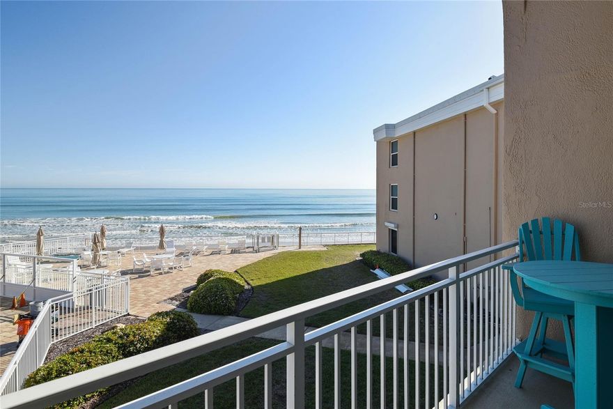 Just what you've been waiting for: Fully Renovated and Direct Ocean Front Views. This is the Quintessential Beach Pad on New Smyrna's coveted NO-DRIVE BEACH! Ocean Club North has completed the Milestone and Structural Integrity Reserves Studies. No Unpaid Special Assessments! B-213 is located in the "B" Building which has a brand new roof!  Residence B-213 underwent a complete interior renovation that was completed in 2024. New Windows in Primary Suite in 2025. The all new kitchen features gorgeous solid wood cabinets, quartz counter tops and stainless appliances. Open Floor Plan so you can enjoy ocean views from the kitchen and great room. The open kitchen and living areas include an island, built-in bar area with beverage refrigerator and a coffee bar. Luxury Vinyl Plank flooring throughout the living areas. There is a full bathroom downstairs with custom tile shower. Upstairs, and rare at Ocean Club North, the renovation included creating an ensuite Primary Bedroom with a full bathroom. Beautiful custom tile shower and solid wood vanity cabinet. The 2nd bedroom has an ensuite 1/2 bath, affording privacy for both the owner and guests. This thorough renovation included adding a washer/dryer in the residence. Complete renovation completed 2024. A/C new in February 2025. Storm Shutters on windows and sliders provides additional peace of mind. As an owner at Ocean Club North you also have access to the bike storage building and a dedicated storage area next to the Complex's laundry room. Beautiful Ocean Front Pool and sun deck. Ocean Front Shuffle Board. Private Tennis Court. All measurements are approximate, and Buyer is responsible to verify all dimensions. Be sure to check out the Photos and Virtual Tour!