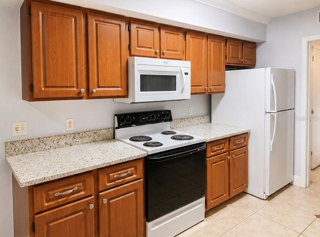 Photo of 738 Crest Pines Drive #728, Orlando, FL 32828 (MLS # O6406825)