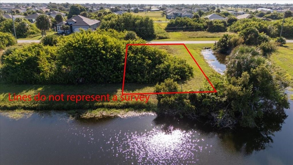 Photo of 155 Spring Drive, Rotonda West, FL 33947 (MLS # C7516114)