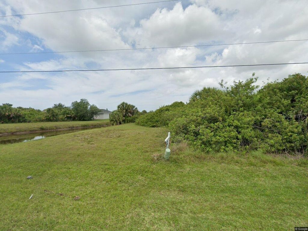 Photo of 155 Spring Drive, Rotonda West, FL 33947 (MLS # C7516114)