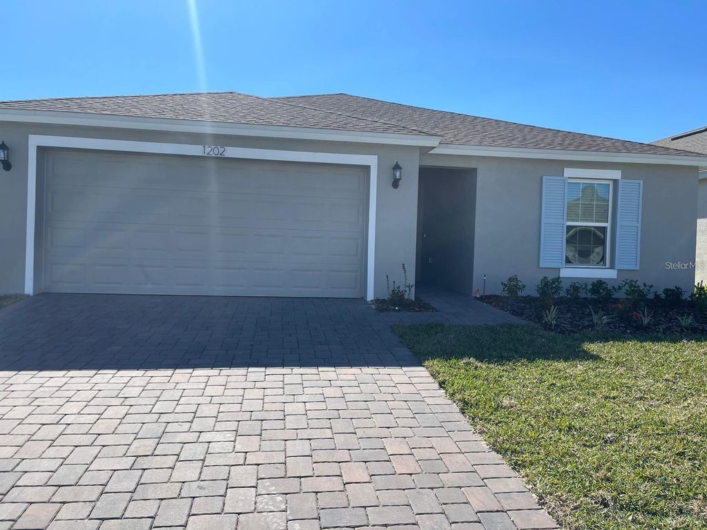 Photo of 1202 Tupelo Trail, Haines City, FL 33844 (MLS # O6367747)