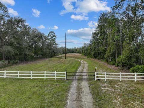 Photo of 310 N Otter Creek Avenue, Bronson, FL 32621 (MLS # GC526307)