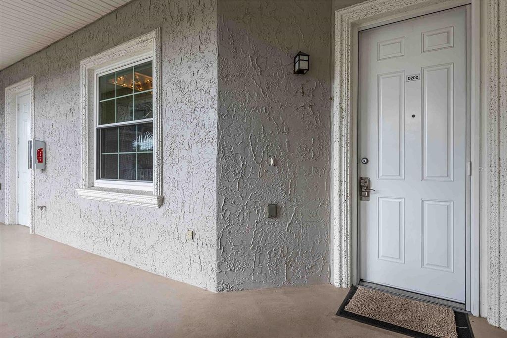 Photo of 6808 Dali Avenue #D202, Land O Lakes, FL 34637 (MLS # TB8477254)