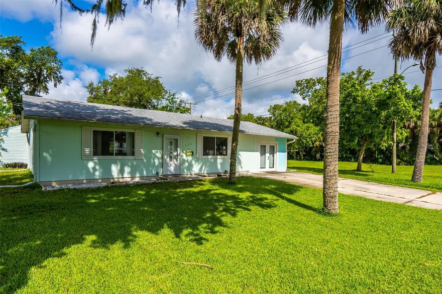 Welcome to your new home! Great interior with plenty of room for the family with a 3rd bedroom or flex space where the garage has been converted. You also have another bonus room in the back for additional room or home office. Located on a quiet street with little traffic and plenty of parking for your RV's, boats and trailers. Close to the river, beach and 95. Updated cabinets, flooring, large screened in porch and large shed out back with private, backyard. Schedule your showing today! ;Water: City