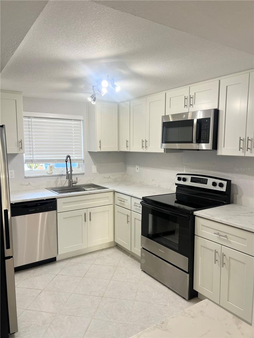 Photo of 4550 Overlook Drive NE #156, St Petersburg, FL 33703 (MLS # TB8506889)