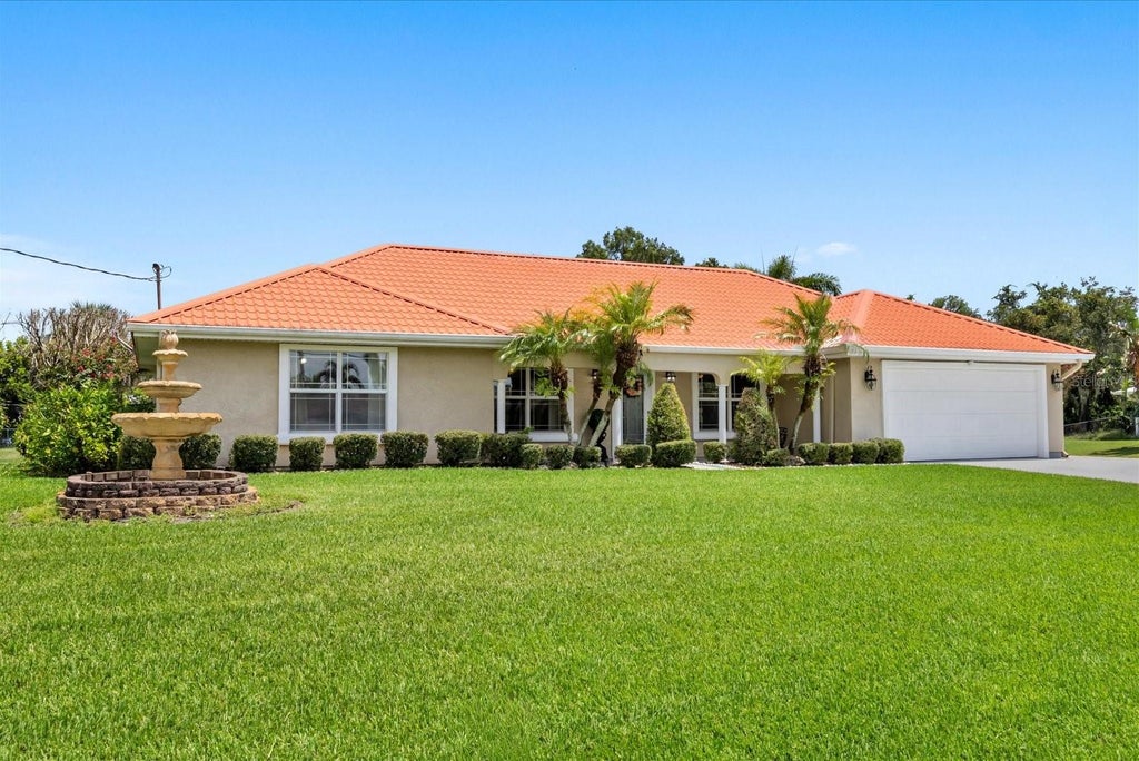 Photo of 1819 SE Elrose Street, Port Saint Lucie, FL 34952 (MLS # O6435760)