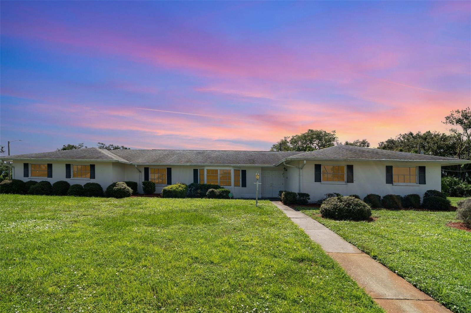 Discover your own slice of Florida living! This spacious 4-bedroom, 2-bath ranch-style home offers 2,592 sq. ft. of comfort on a generously sized lot. Designed with a flowing floor plan and sturdy block construction, the home is perfect for both everyday living and entertaining. Step outside to your private backyard retreat, complete with a sparkling pool—ideal for summer gatherings or quiet relaxation. With its combination of space, style, and a true indoor-outdoor lifestyle, this home is a must-see!