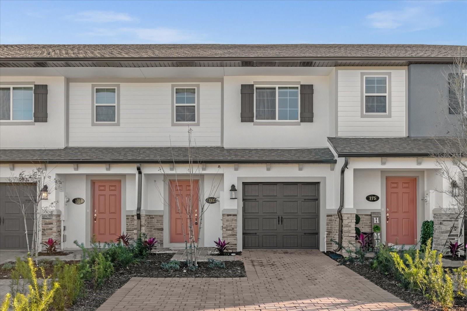 Stunning - brand new construction Townhome in upscale community of Lake Monroe Commons. Never lived in - featuring contemporary design with elegant dark plank ceramic flooring on first floor and plush upgraded carpet on second floor. Enjoy the open floorpan with a gourmet kitchen - 42' cabinets, quartz countertops and stainless steel appliances. Second floor with large master retreat and 2 additional bedrooms. This gated community offers its residents a community pool with cabana and close access to beautiful Lake Monroe and the Sanford Riverwalk. Call and schedule your private viewing today !