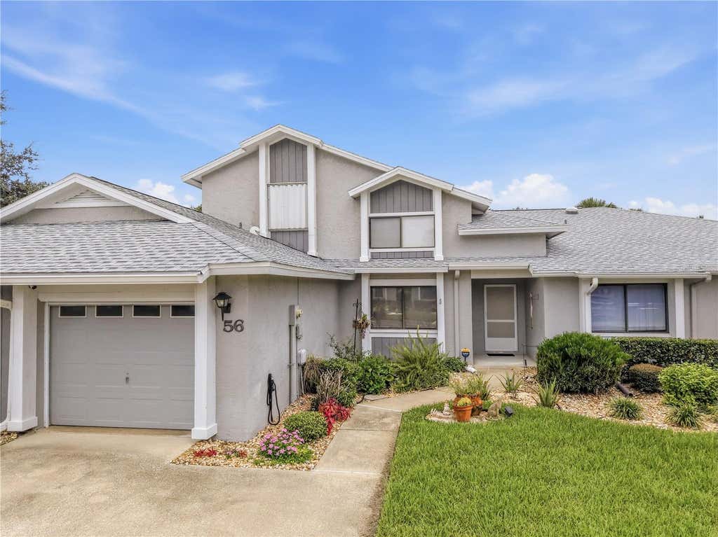 Photo of 56 Lake Forest Place, Palm Coast, FL 32137 (MLS # S5155162)