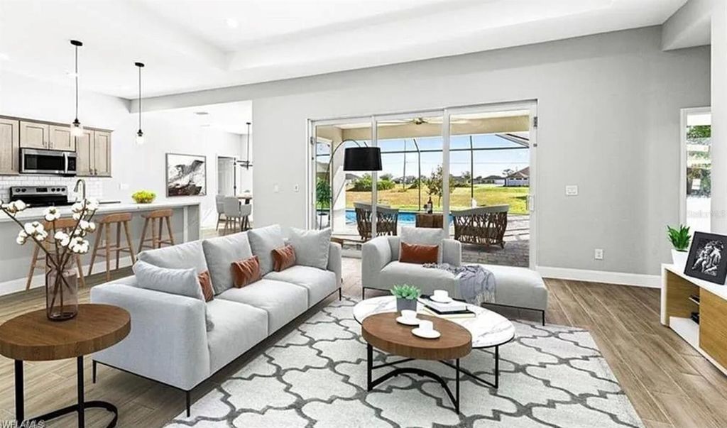 Photo of 2153 NW 18th Avenue, Cape Coral, FL 33993 (MLS # OM718770)