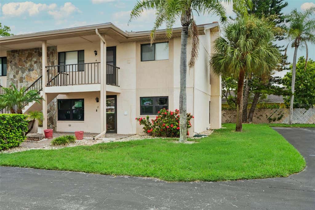 Photo of 9920 Eagles Point Circle #2, Port Richey, FL 34668 (MLS # FC320557)