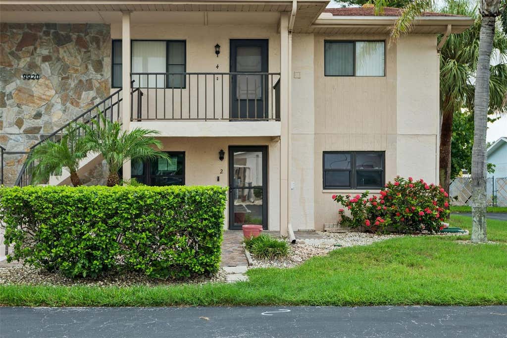 Photo of 9920 Eagles Point Circle #2, Port Richey, FL 34668 (MLS # FC320557)