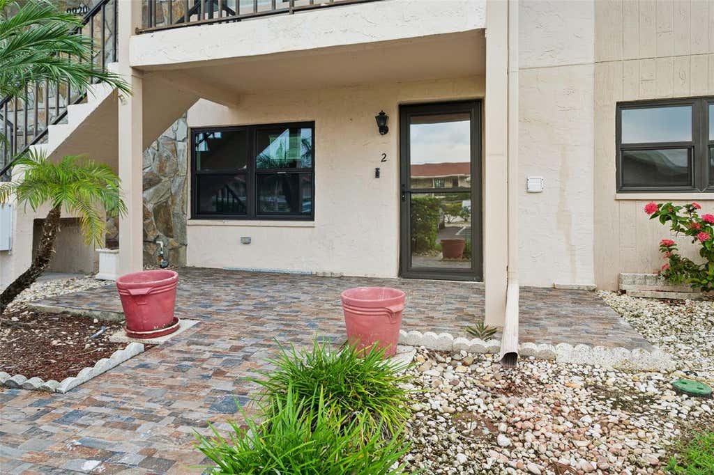 Photo of 9920 Eagles Point Circle #2, Port Richey, FL 34668 (MLS # FC320557)