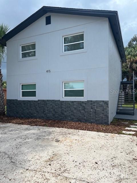 Must see duplex located in walking distance of Armature Works, Ulele and the Tampa River Walk. Situated on a large lot the building consists of two fully renovated 2 bed 1 bath units. This property has been masterfully renovated from top to bottom. The units boast beautiful luxury vinyl plank floors, updated kitchen with quartz countertops, stainless steel appliances and fully updated bathroom with tile shower wall. Each unit includes celing fans in each room, recess lights throughout, washer dryer. and low electric bills due to brand new central A/C system, hurricane impact windows, plumbing and roof. Be an owner occupant or rent the units out for income. Own your piece of this growing hot spot in the Tampa Bay area.