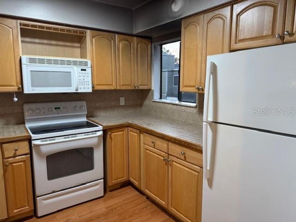 Photo of 304 Scottsdale Square #304, Winter Park, FL 32792 (MLS # O6372843)