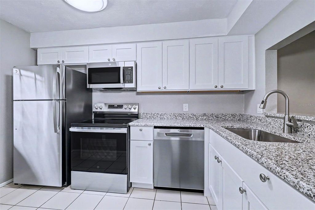 Photo of 3661 Trophy Boulevard #3661, New Port Richey, FL 34655 (MLS # TB8507129)