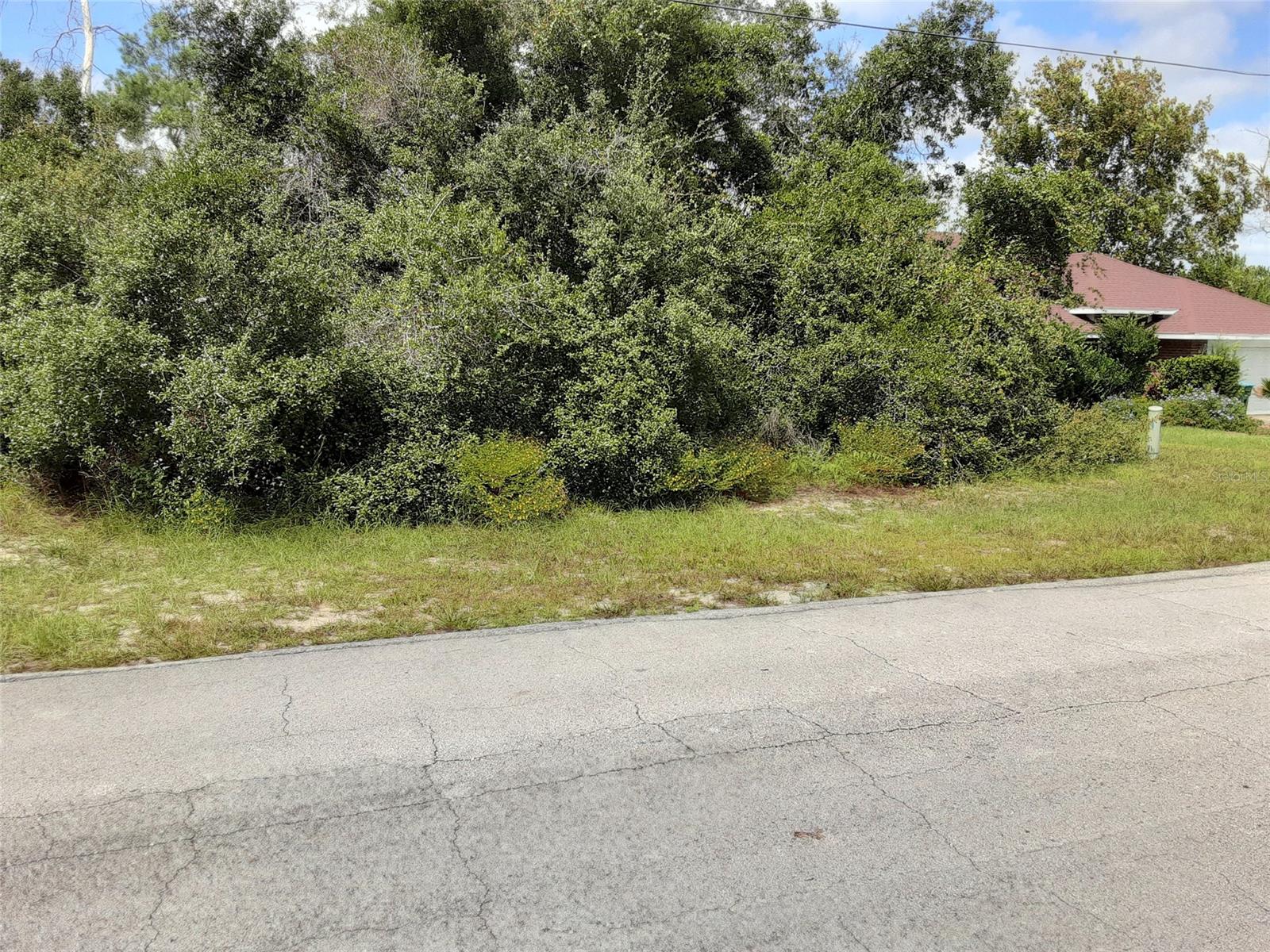 Nice building lot in Deltona Lakes, newer homes nearby, close to shopping with easy access to I-4 and other major roads.; Cleared: No
