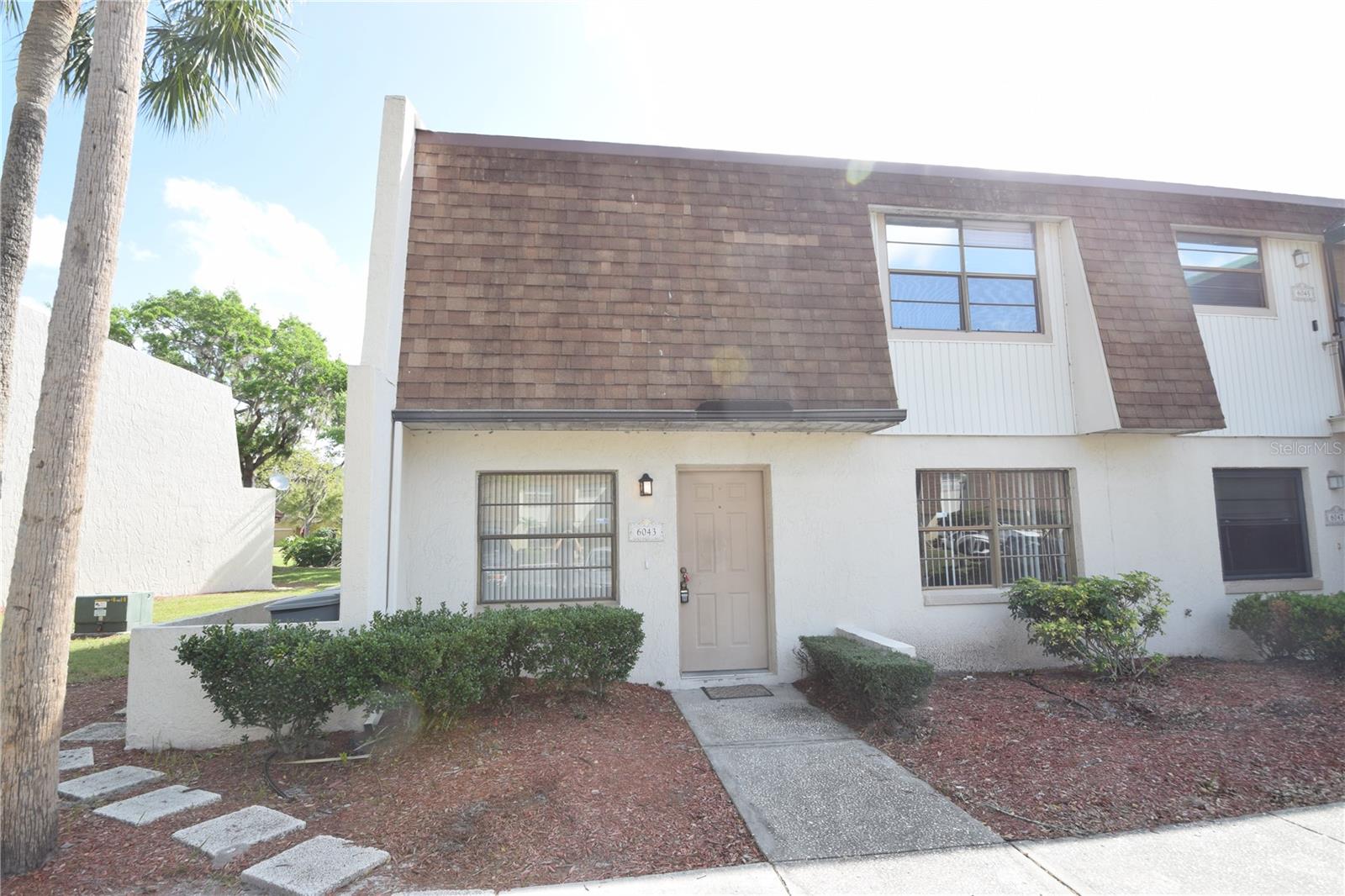 This charming end-unit, 2-bedroom, 1-bath ground-floor condo is located in the highly desirable Imperial Lakes at Fairwoods community—conveniently situated near Shepherd Road and South Florida Avenue. Step inside to find low-maintenance ceramic tile flooring throughout the main living areas and bedrooms. Both bedrooms feature spacious walk-in closets, and the screened-in back porch offers a perfect spot to relax or entertain. A washer and dryer are included for everyday convenience. A brand-new ac was just installed. Residents enjoy access to a sparkling community pool, and the monthly HOA fee covers exterior maintenance, pest control, and trash service—making this an easy, low-maintenance lifestyle. Cash and conventional financing are accepted. Please note: the community is not approved for FHA financing.