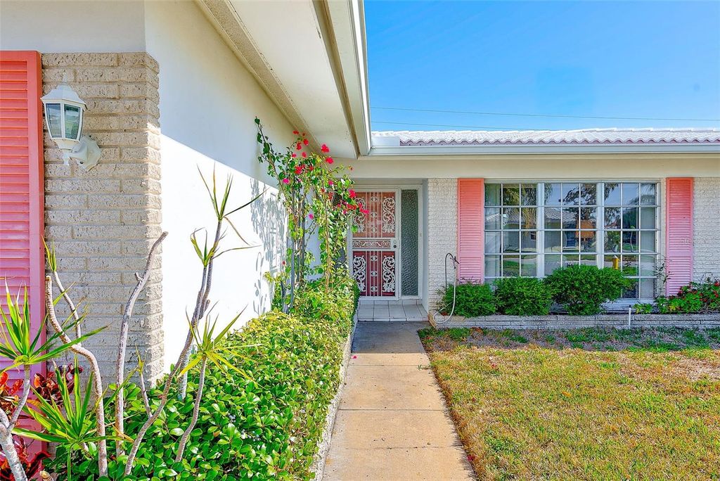 Photo of 10421 Imperial Point Drive W, Largo, FL 33774 (MLS # TB8456102)