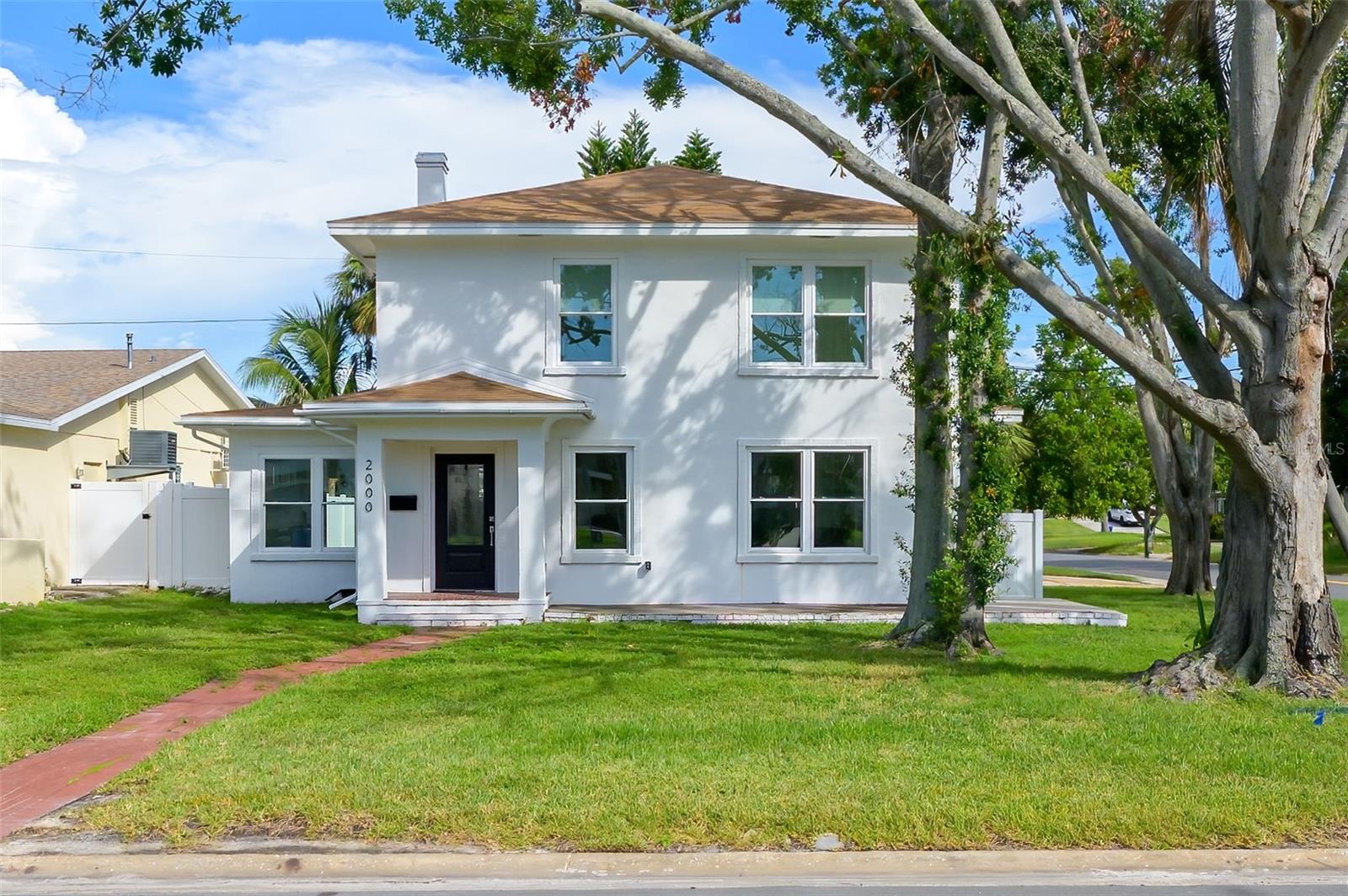 Live in a piece of history with this beautifully updated two-story home in Shore Acres, where 1926 character meets today’s modern upgrades. Inside, you’ll enjoy a spacious two-level layout complemented by dual AC units, hurricane-impact windows, and updated electrical for peace of mind. Step outside to your private pool oasis, complete with a new motor, fresh vinyl fencing, and an inviting patio deck—perfect for both relaxing and entertaining. Situated on a desirable corner lot, this home offers privacy and charm in equal measure.
The upstairs living space remained untouched during recent storms, ensuring a comfortable and secure environment. Located just minutes from downtown St. Pete, you’ll have quick access to shopping, parks, and waterfront dining.