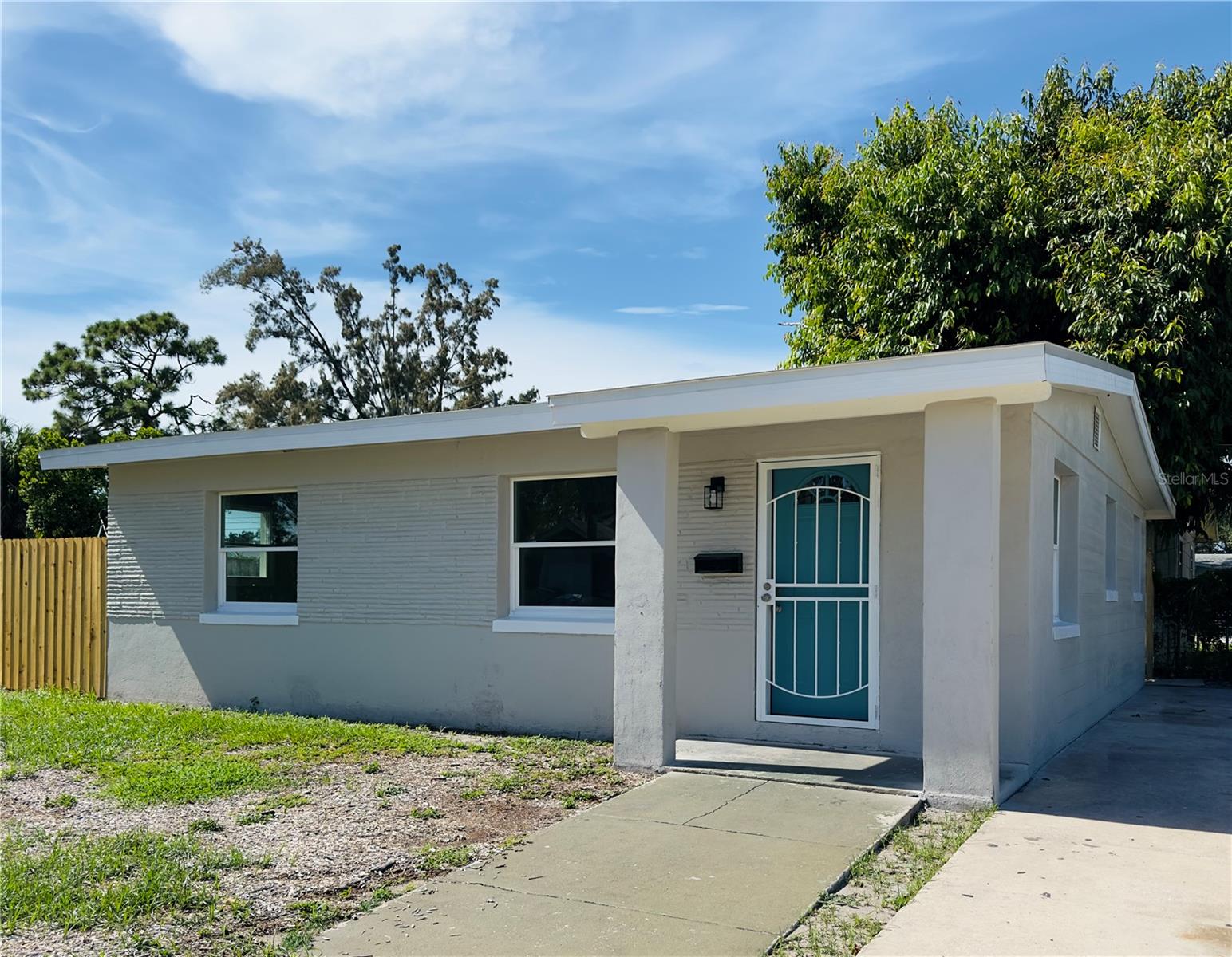 Discover this beautifully updated 700 sq ft home! Perfectly blending charm and modern convenience, this 2 bedroom, 1 bathroom property is move-in ready with brand new kitchen, bathroom, and appliances. Inside, you'll find an open and efficient floor plan with fresh flooring, new paint, and upgraded lighting throughout. The kitchen features sleek cabinetry, quartz countertops, and stainless steel appliances, while both bathrooms offer stylish tile work and modern fixtures. Enjoy low-maintenance living in a freshly renovated space just minutes from downtown St. Pete, Gulf beaches, shopping, dining, and major highways. Available now! Schedule a showing today!