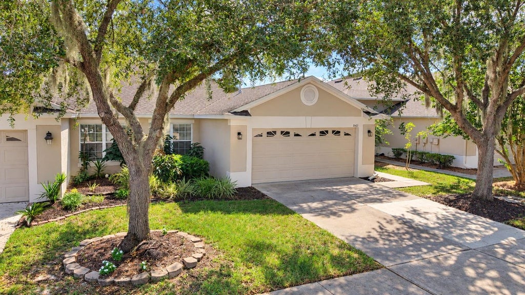 Photo of 31421 Shaker Circle, Wesley Chapel, FL 33543 (MLS # TB8558933)