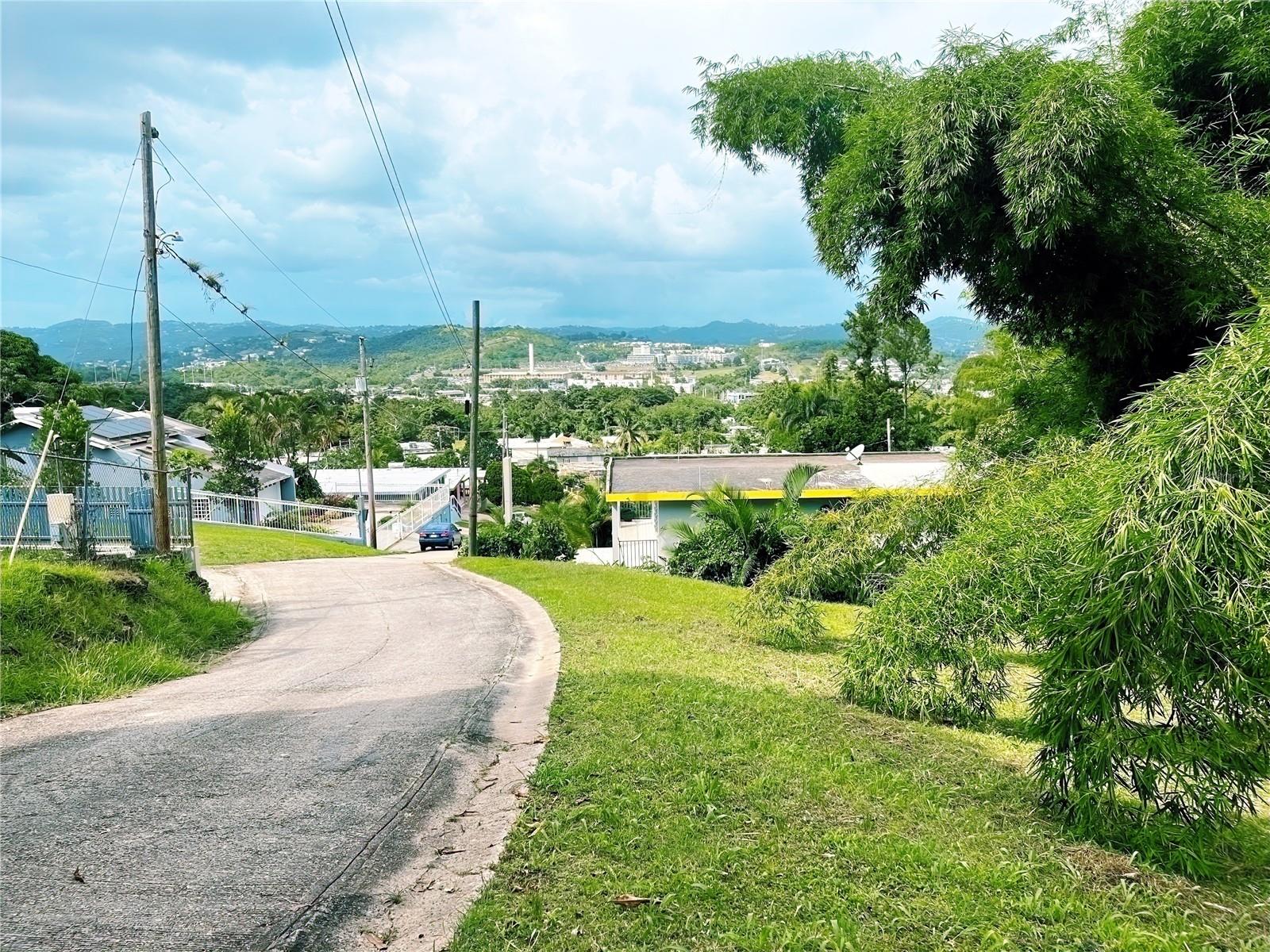 Partial Owner financing available of the sales price. Land in the beautiful city of Cayey. It measures 1,032.90 square meters and is located two minutes from PR-52. Cayey is a vibrant town with a cool climate year-round, nestled between the mountains and the city. Centrally located, close to shopping centers, universities, restaurants, schools, medical services, hospitals, and much more. The land is flat and gently sloping. Sold as is.
Permitted Uses
- Rating: R-I
* Short-Term Supplemental Lodging
* Bed and Breakfast
* Apartment House
* Nursing Home, limited to two (2) occupants
* Row House
* Courtyard House
* Guest House
* Day Care Centers
* (by exception) Non-profit Civic Club
* Startup Businesses
* Specialized Lodging
* (via exception) Hostel
* (via exception) Hotel within a historic zone
* Urban gardens
* (via exception) Philanthropic institution with non-monetary or charitable purposes
* (via exception) Religious institutions
* Tiny houses
* Second floors
* Single-family homes
* (via exception) Light commercial uses