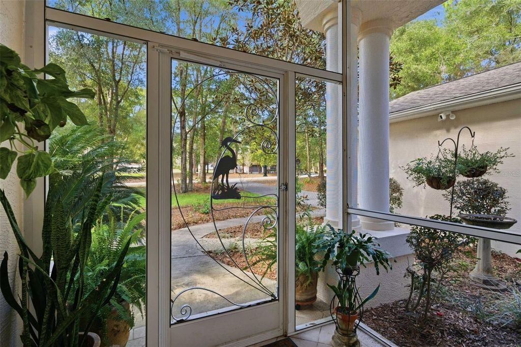 Photo of 9925 SW 203rd Circle, Dunnellon, FL 34431 (MLS # OM717209)