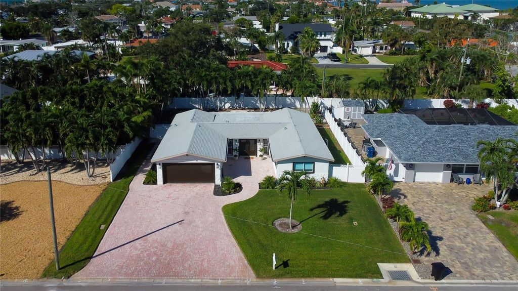 Photo of 119 8th Street, Belleair Beach, FL 33786 (MLS # TB8433898)