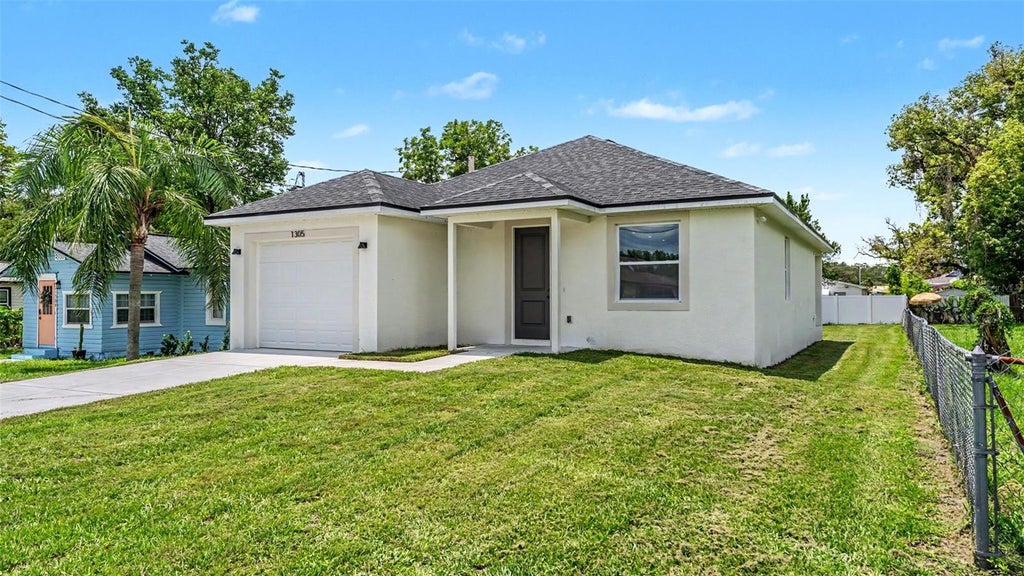 Photo of 1305 E Parker Street, Lakeland, FL 33801 (MLS # L4962940)