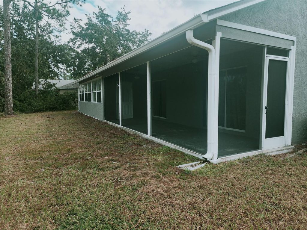 Photo of 83 Pepperdine Drive, Palm Coast, FL 32164 (MLS # FC313790)