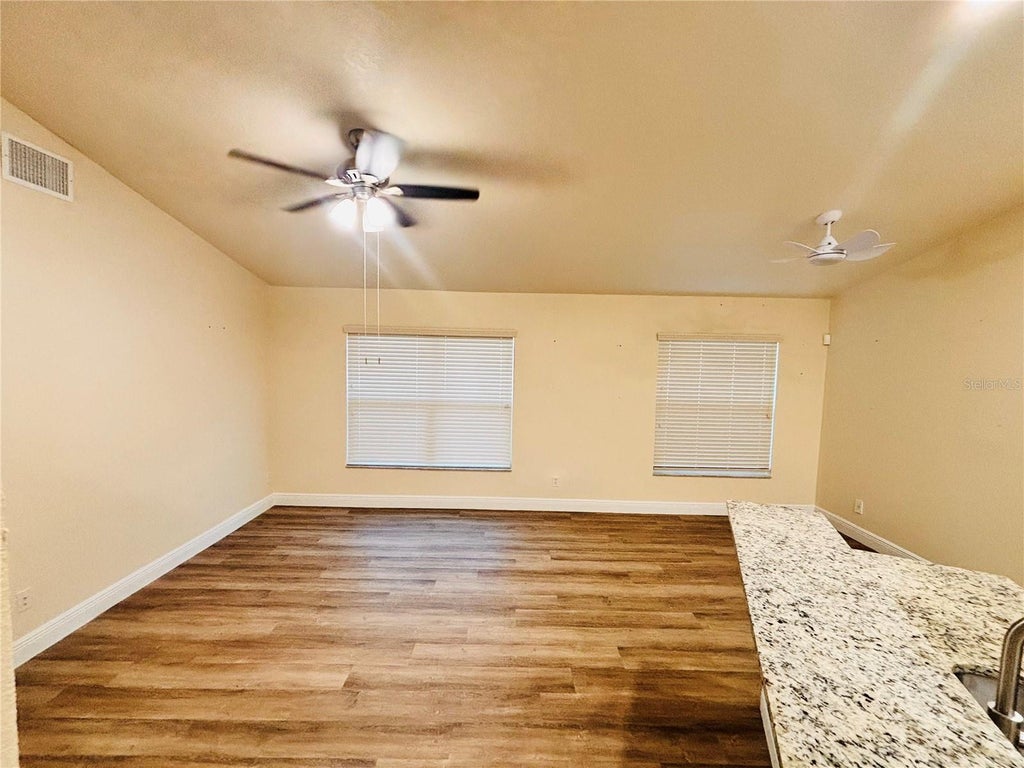 Photo of 8444 Fort Clinch Avenue, Orlando, FL 32822 (MLS # O6451622)