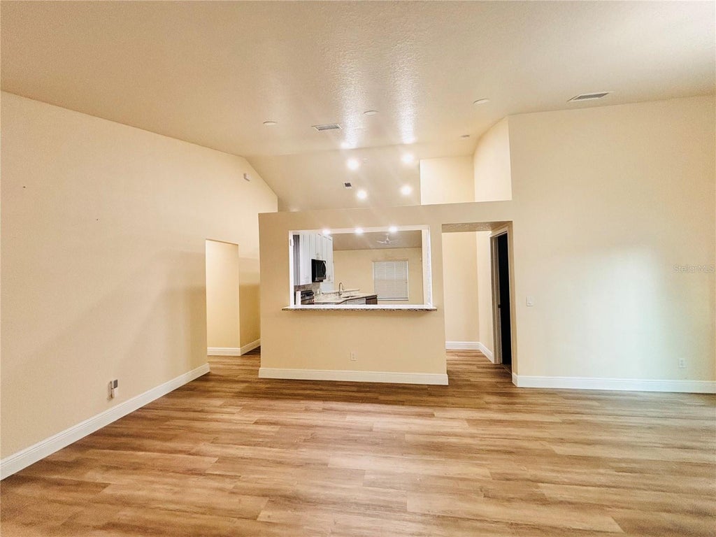 Photo of 8444 Fort Clinch Avenue, Orlando, FL 32822 (MLS # O6451622)