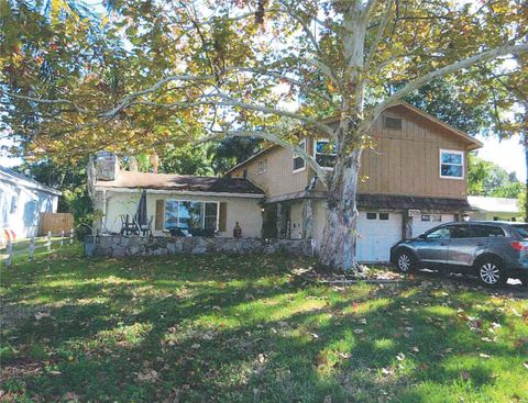 Photo of 705 Shore Drive E, Oldsmar, FL 34677 (MLS # TB8458306)