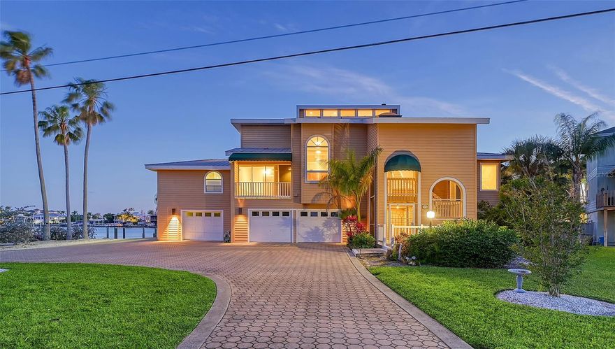 Nestled in the prestigious West of the Trail area, this waterfront estate home offers a prime location on Ringling Cove, with protected water and stunning views of Sarasota Bay. Situated next to Sun Circle Park, this exclusive property enjoys the privacy of having only one neighbor to the north. This grand three-story home boasts four bedrooms and five and a half bathrooms, with each bedroom featuring an en suite bathroom and a private balcony overlooking the water.
The second level of the home features two Master suites. The entire home is wheelchair accessible, with an elevator providing access to the main living level on the second floor. The ground floor opens up to a pool area through sliding glass doors, perfect for outdoor entertainment.
On the main living level, you'll find separate living and dining rooms, both Master Suites, and a kitchen with eat-in space and a balcony overlooking the front yard. The second living level houses two guest suites, each with its own balcony overlooking the water. A wood-burning fireplace adds warmth and charm, shared by the Living Room and one of the Master bedrooms.
The property features plantation shutters for window coverings, Oak flooring, and Birch and Cherry cabinetry throughout. Etched glass windows adorn the front, while manual crank-out windows on the third floor provide a classic touch. A boat dock offers direct access to Sarasota Bay, perfect for boating enthusiasts.
Conveniently located within walking distance to the Ringling Museum and Asolo Theater, and close to downtown Sarasota, this property offers a luxurious waterfront lifestyle in a sought-after neighborhood. This property is being sold as is, presenting an excellent opportunity for customization and personalization to suit your preferences.