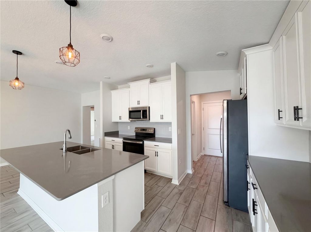 Photo of 5108 Tanzanite Drive, Mount Dora, FL 32757 (MLS # O6397681)