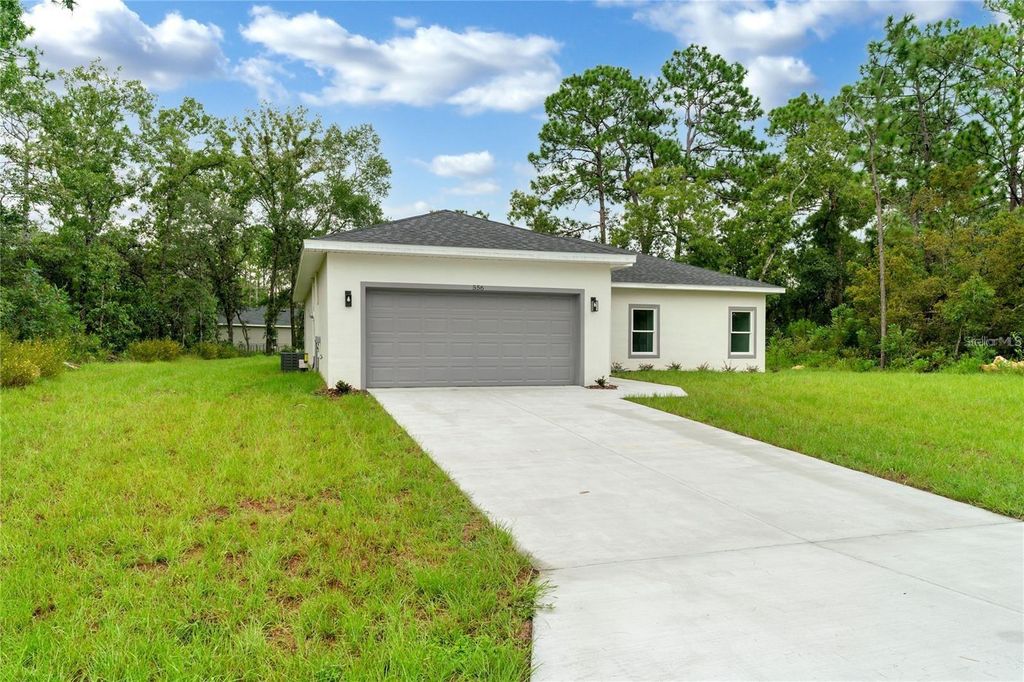 Photo of 556 Marion Oaks Pass, Ocala, FL 34473 (MLS # O6356707)