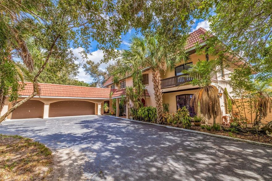 The Skyway Equestrian Center is on the market!  This nearly 5 acre horse ranch is located in Palmetto, Florida, and is just waiting for your equestrian needs.  The property is 4.9 Acres and is board fenced and cross fenced.  The meandering paved driveway leads you around a pond with a footbridge to a 3,967 Sq. Ft. 2 story 5 bedroom, 3 bath, Mediterranean style home with barrel tile roof trin and flat roof and a 3 car attached garage.  Home has a large eat-in kitchen and great room with a wood burning fireplace and an impressive entrance foyer.  The kitchen has modern appliances, tile and island. Floor coverings are carpet and tile.  upstairs are spacious bedrooms and an elevated deck spanning the width of the house.  Out back has a big screened in porch overlooking the firepit, paddock, Vinyl clad log cabin guest house and barn.  The cabin is 1 Bedroom, 1 bath and great room with modern kitchen.  This cabin can be a guest quarters or residence for a farm manager.  The crowning touch to this unique property is the 20 stall Horse Barn with tack room, 1/2 bath and water to the stalls.  The barn has pavers for the common area floor and the stalls are full sized.  The back of the barn leads to a fenced training circle.  The location is a short drive to Interstate 275 and is equidistant to Tampa, St. Petersburg and Sarasota-Bradenton. Research indicates that a full service horse stall can rent in this area for $800-$1,000 per month. This is a real winner-You do the math.  All sizes are approximate.