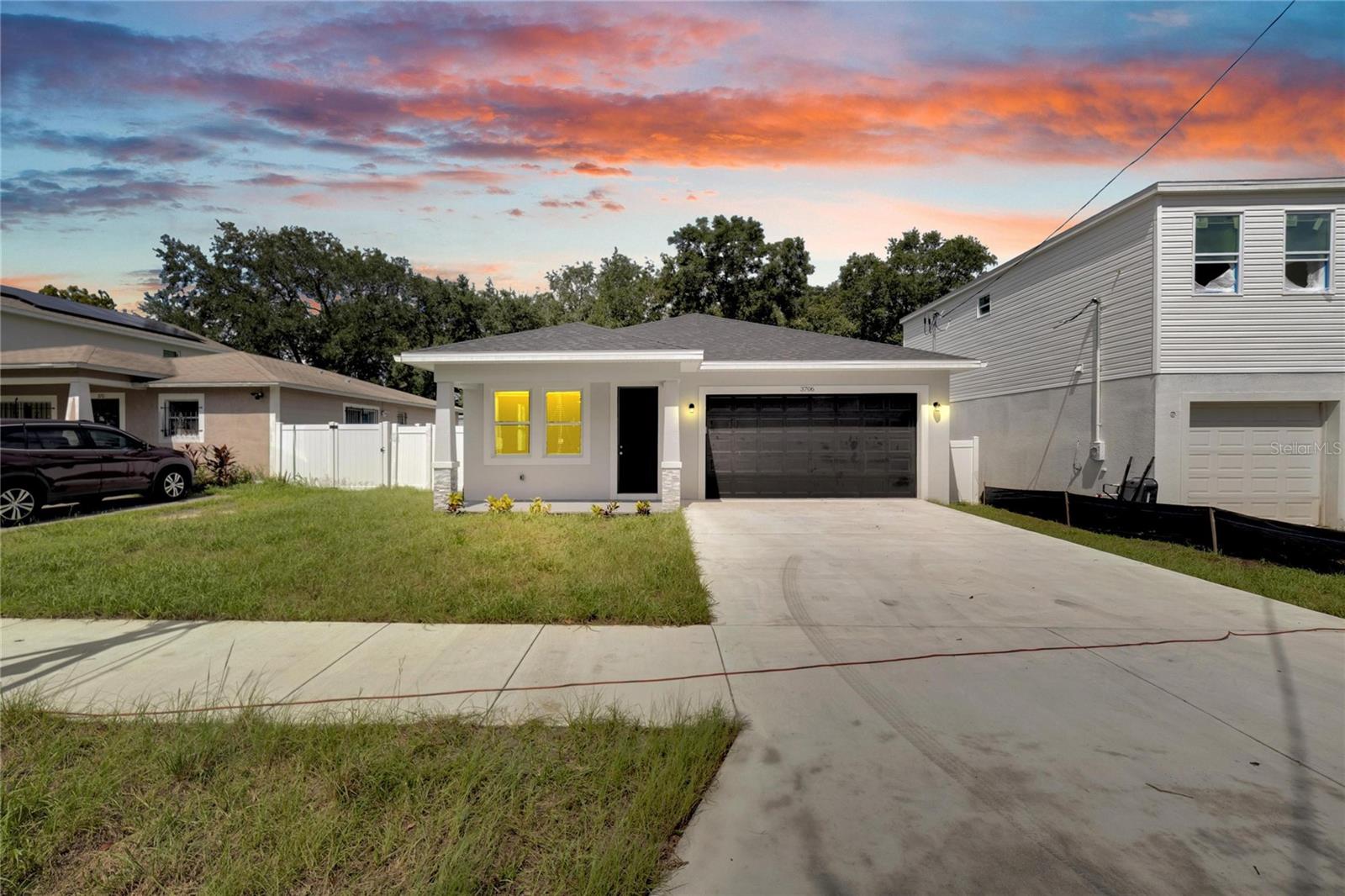 READY TO MOVE!!! New construction property features 3 bedrooms, 2 and a half bathrooms, and boasts luxurious amenities such as: Luxury vinyl flooring throughout the house, providing durability and elegance. Quartz countertops in the kitchen, offering a sleek and modern surface for meal preparation. cabinets and backsplash in the kitchen and on the kitchen island, creating a bright and stylish culinary space. Tile for all bathrooms, ensuring a clean and polished look. Stainless steel appliances, adding a touch of sophistication to the kitchen. Frameless glass door for the master shower, providing a contemporary and spacious feel to the bathroom. With its combination of high-end finishes and thoughtful design elements, this property promises to comfort and luxury for its future residents.