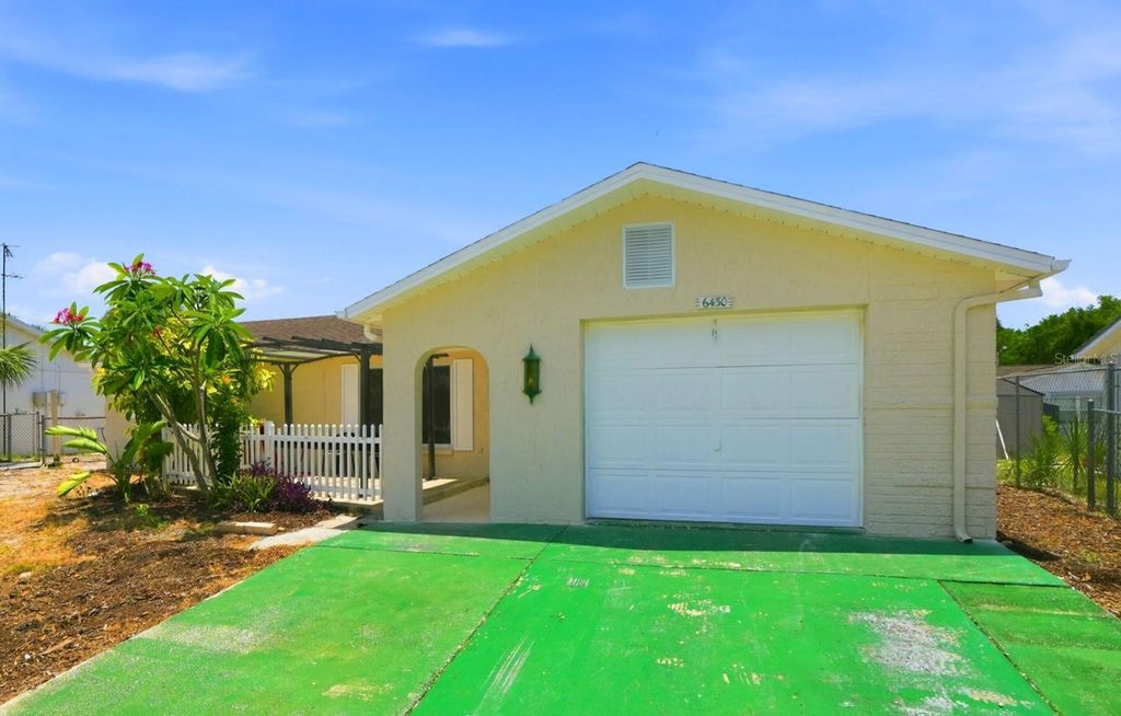 Photo of 6430 Baldwyn Avenue, New Port Richey, FL 34653 (MLS # TB8517235)